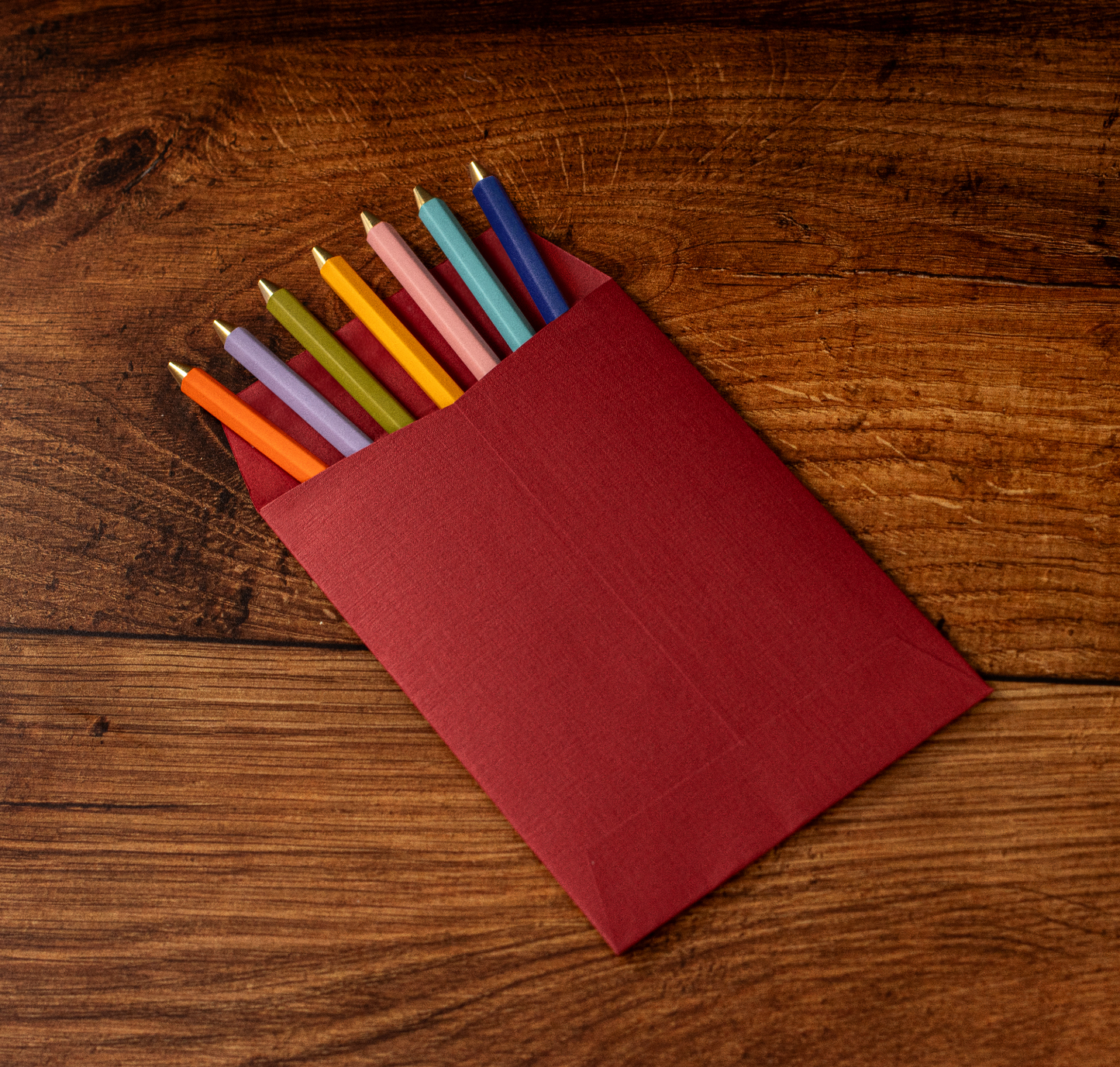Red Envelope with Pens Inside