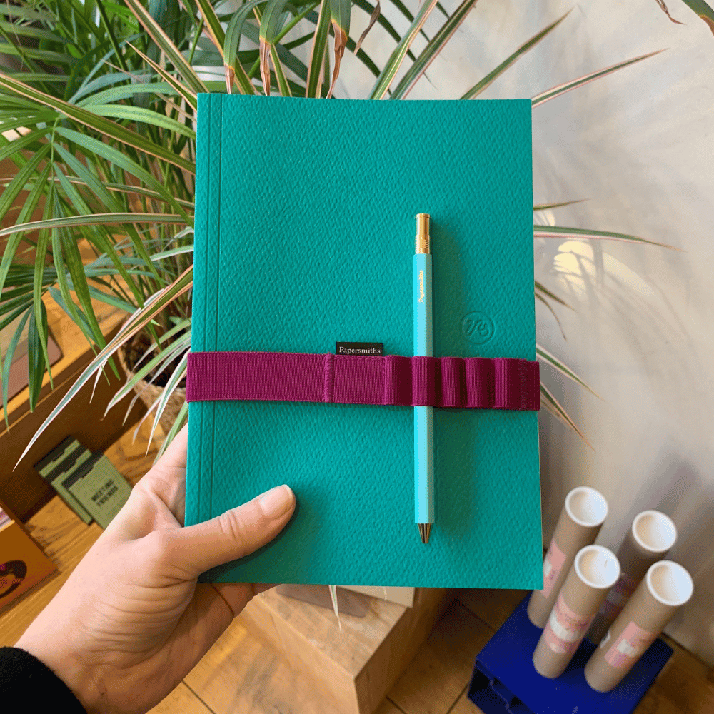 Notebook band and pen