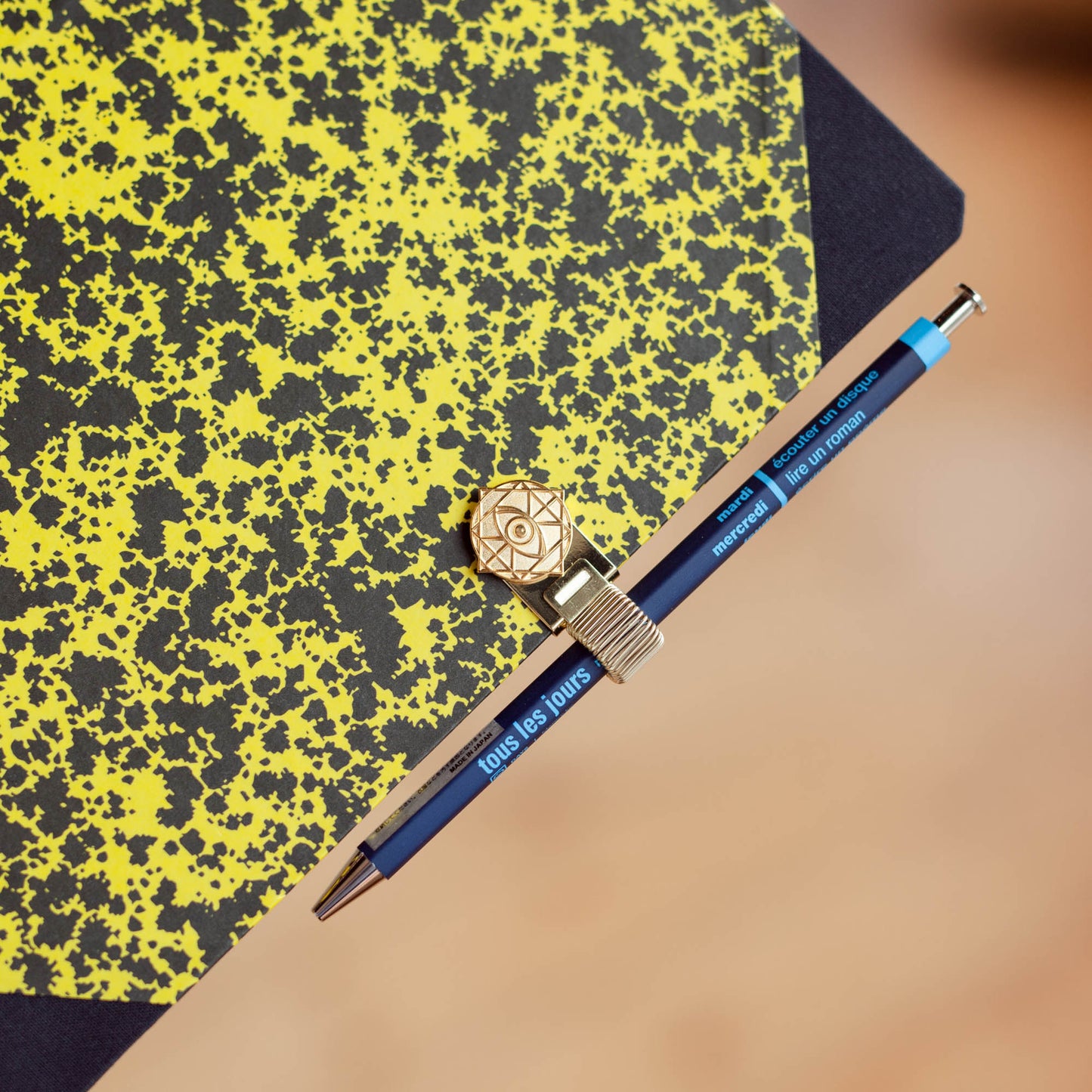 Gold Clip on Notebook Cover