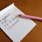 Piece of paper with sample writing on it