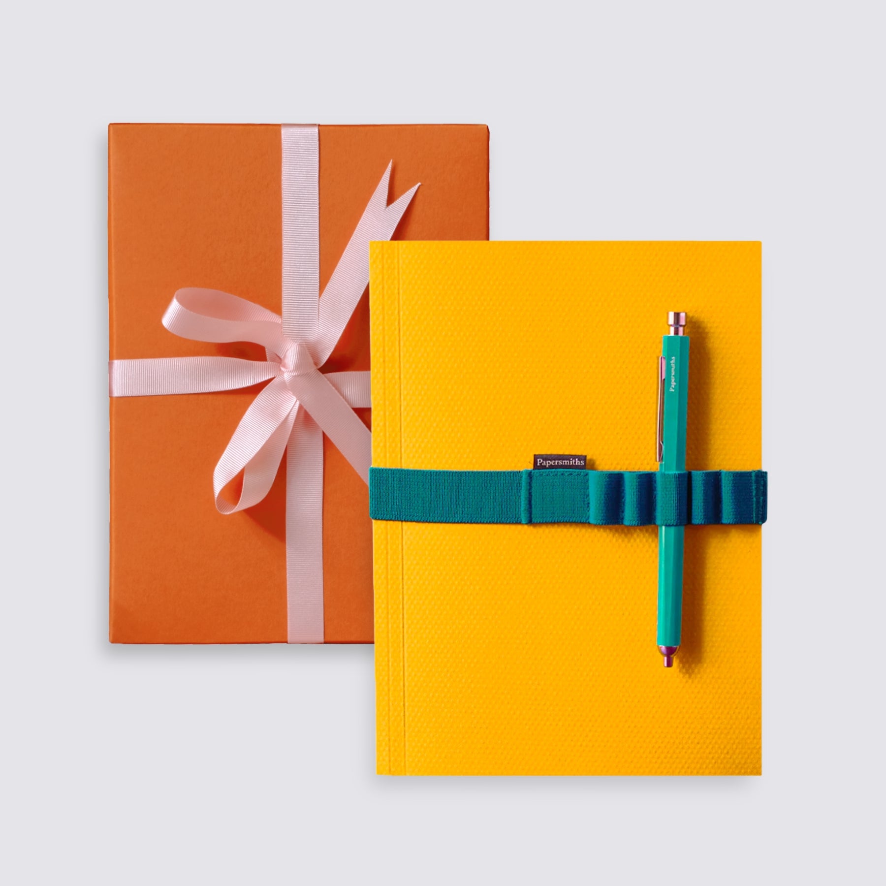 yellow notebook and pen set
