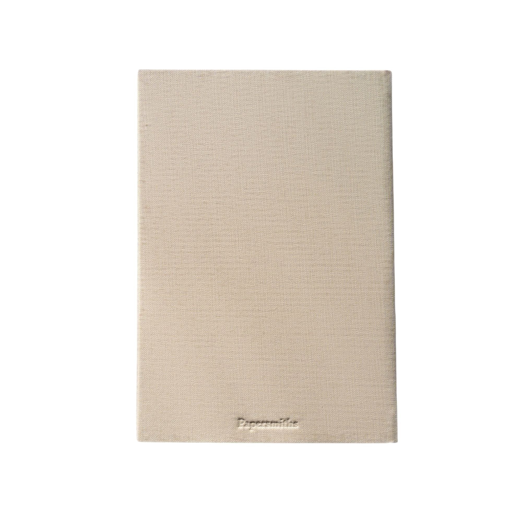 A rectangular beige textured fabric cover or pouch with a small debossed brand name at the bottom, shown against a plain white background.
