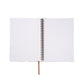 Open notebook with blank pages on a white background