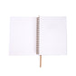 White spiral-bound notebook on a white background