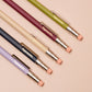 Set of colorful pocket pencils with 'Papersmiths' branding on a beige background