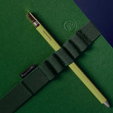 green notebook and pen set