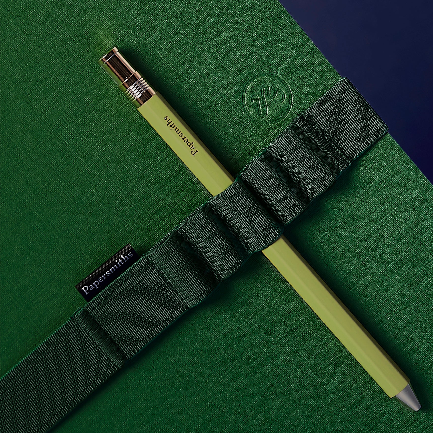 green notebook and pen set