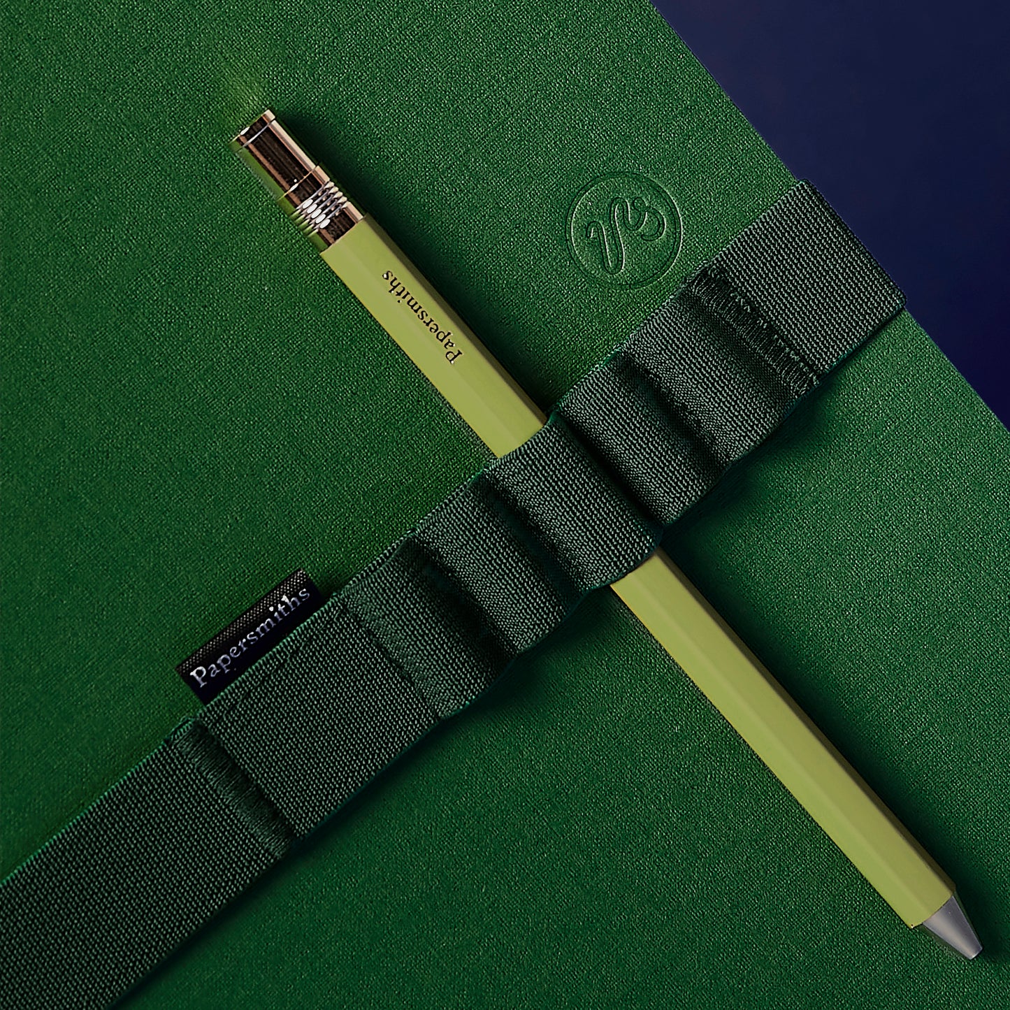 green notebook and pen set