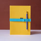 Yellow Notebook with pen