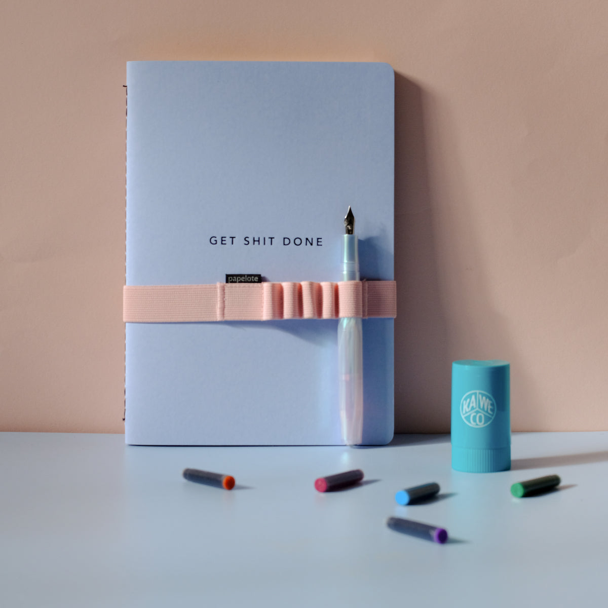get shit done blue notebook and pen
