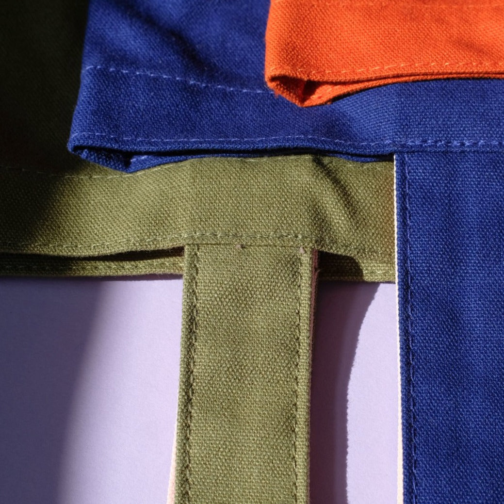 green blue and orange tote bags