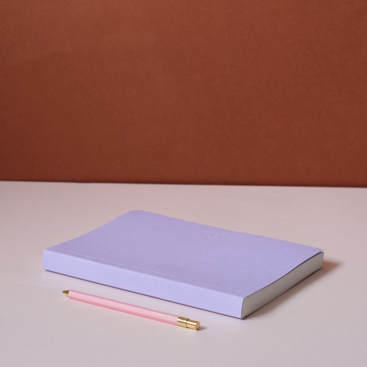 Purple and Pink notebook and pen