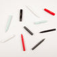 red grey white black and pastel blue rollerball pens