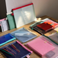 stationery pouches on desk