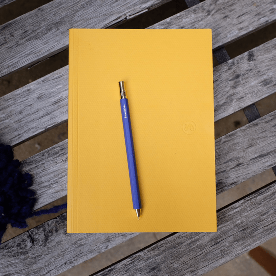 Blue Pen Yellow Notebook