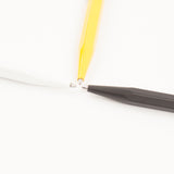 white black yellow ball point pens