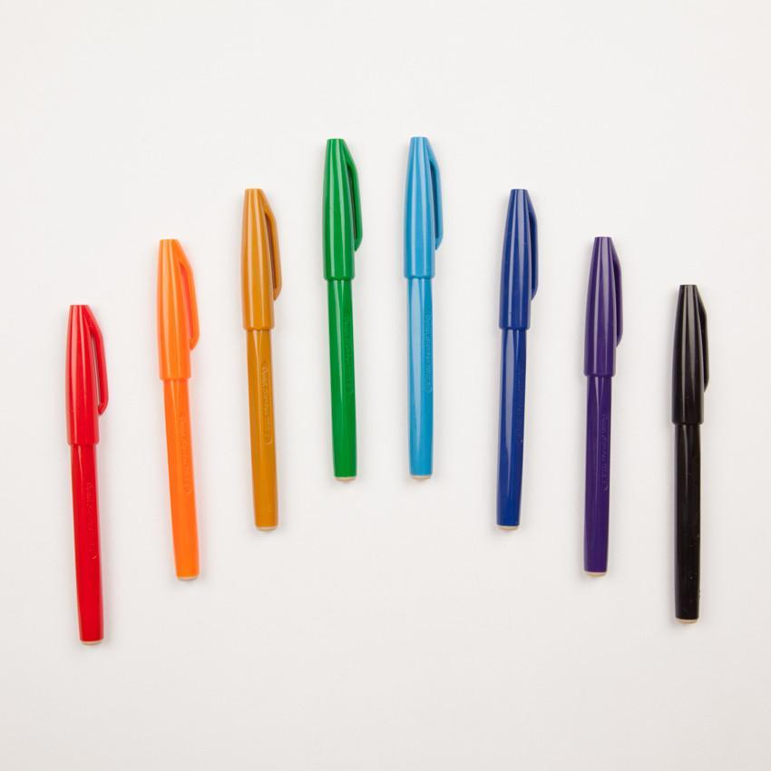 red orange yellow green light blue blue purple and black sign pens